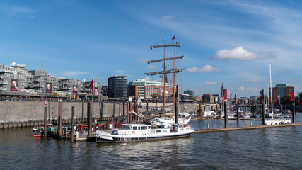 Fototapeta na wymiar old sailing boat in the port of hamburg on a sunny day, germany