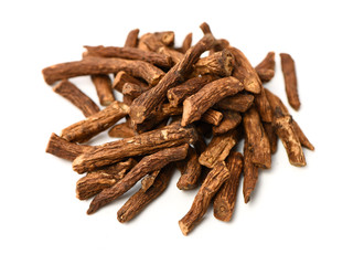 Dried medicinal herbs raw materials isolated on white. Root of Taraxacum. Blossom, dandelions.