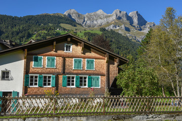 Rural landscape with traditional chalet at Engelberg in the Swiss alps