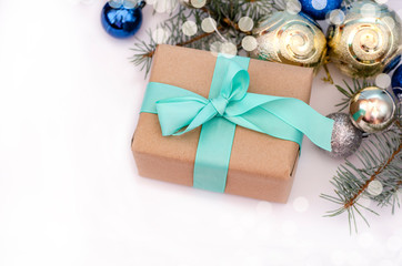 Decorated Christmas gift on white background. Stylish blue craft christmas gift box isolated on white background.