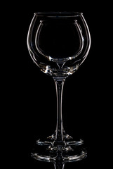 empty wine glass, on black background. Promotional photo