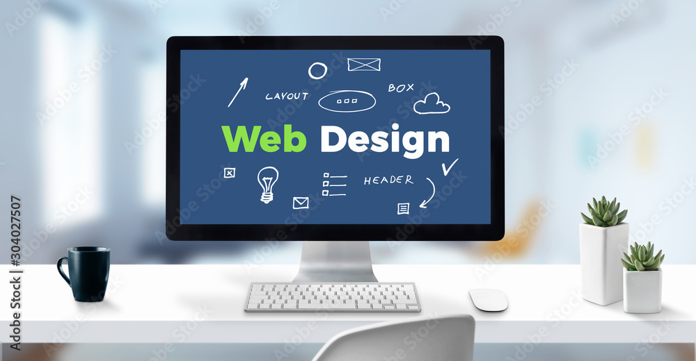 Poster Web design text on computer display surrounded by sketch web page elements. Clean work desk with cup of coffee and plants.