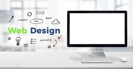 Computer display mockup on work desk. Web design text surrounded with drawn elements. Planning...