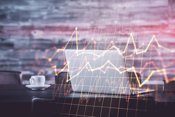 Double exposure of graph and financial info and work space with computer background. Concept of...