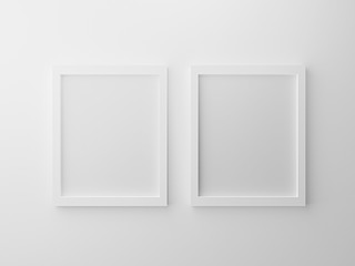 Blank paper frames isolated on white wall at studio. 3d render design concept for product object. Empty clean two picture hanging on gray background texture for mockup poster and place image. Interior