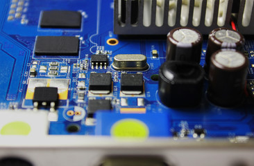 Closeup of electronic circuit board or PCB printed circuit board