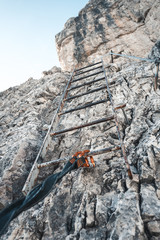 Obraz premium Close up of a via ferrata climbing gear and a letter in the Dolomites, Italy