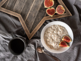 porridge with figs. Healthy breakfast ingredients. vegan food concept