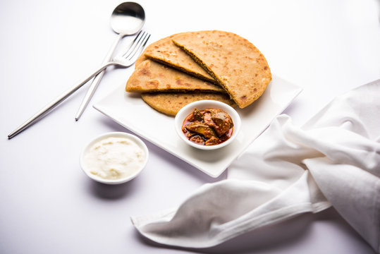 Sattu Ka Paratha / Stuffed Channa Dal Flour Paratha served with mango pickle and curd or dahi