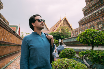 Male tourist in a Buddhist temple.