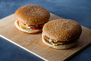 Burger with cutlet cheese and tomato
