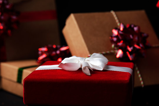red gift box background, christmas gifts and decorations, valentine's day surprise