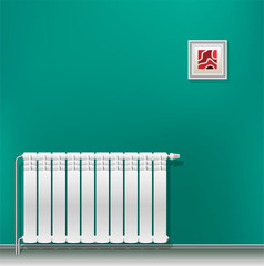 Modern aluminum heating battery hanging on a green blank wall. Housing heating in the winter. Heat saving.