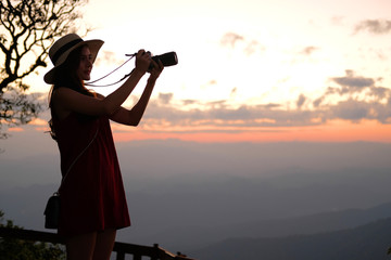 woman take photo. traveler tourist travel on holiday vacation. journey trip concept