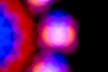 Defocused of photo bokeh blurred circle light from colorful neon lighting bulb in the night for abstract background texture pattern