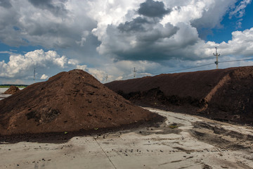 peat processing plant, warehouse of raw materials and finished products
