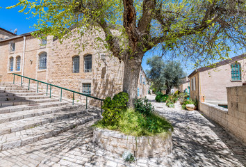 Fototapeta na wymiar Morning in a narrow street of Hebrew residential quarter in old Jerusalem city, Israel