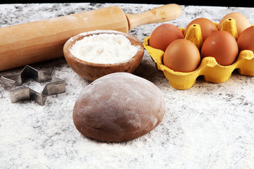 Baking christmas cookies. Typical cinnamon stars bakery with spices. xmas decoration on table