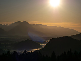 View on the beautiful sunrise over the majestic hills with the Lake Bled in Slovenia