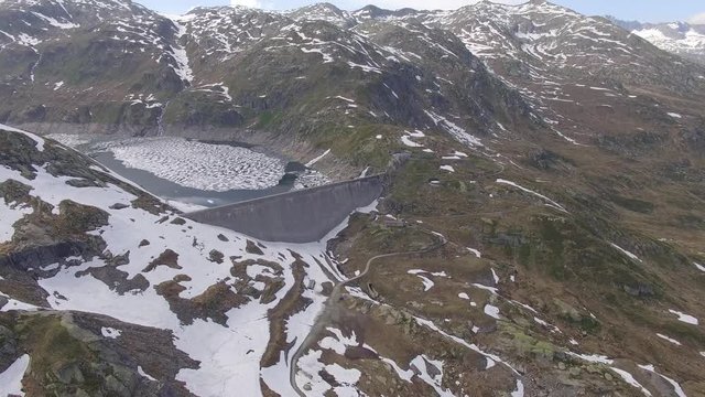 Gotthard Pass, Switzerland. Snowy alpine region of Saint Gotthard in Switzerland, with frozen lakes.