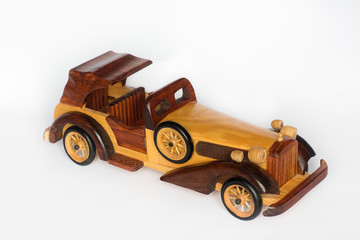 Wooden retro car isolated on a white background