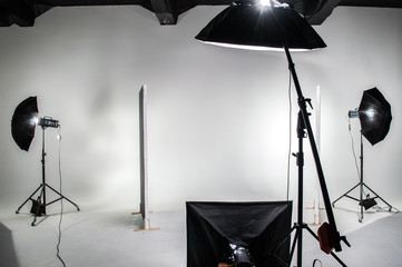 The interior of the photo studio. Preparing to work with photographic equipment. Cyclorama,...