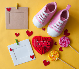 Festive background decoration for birthday celebration with Love word and heart shaped for a baby shower. Top view.