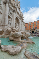 Rome, Italy - October 07, 2018: The Trevi Fountain standing 26 meters high and 20 meters wide, it is the largest Baroque fountain in the city. Fountain di Trevi surronded by hundreds of tourists