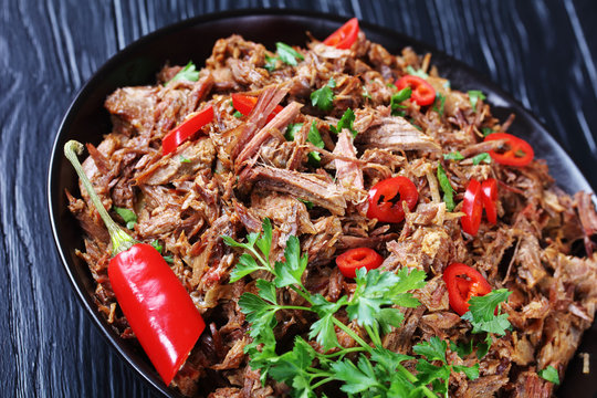 Close-up Of Spicy Pulled Beef In A Bowl