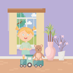 cute girl with train and teddy in the home, kids toys
