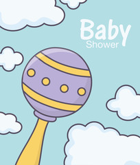 baby shower rattle toy clouds background