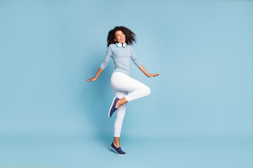 Full length body size side profile photo of cheerful positive cute nice girlfriend with eyes closed excited about having been left alone in white pants isolated pastel blue color background