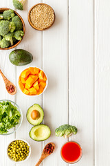 Healthy food. Vegatables and fruits on white wooden background top view frame copy space