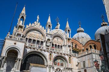 Fototapeta na wymiar Venice, Italy. Details of facade, San Marco Basilica. The Patriarchal Cathedral Basilica of Saint Mark is the cathedral church of the Roman Catholic