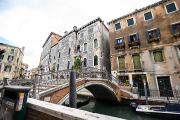 Fototapeta na wymiar 09.10.2019 Venice, Italy, Historic city center, bridge over a narrow canal.