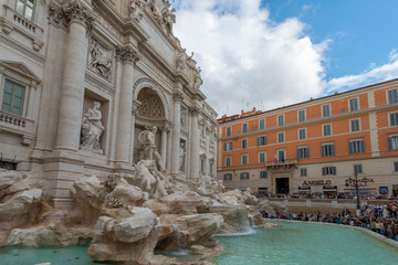 Fototapeta na wymiar Rome, Italy - October 07, 2018: The Trevi Fountain standing 26 meters high and 20 meters wide, it is the largest Baroque fountain in the city. Fountain di Trevi surronded by hundreds of tourists