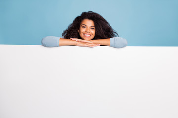 Photo of white, positive nice pretty sweet girlfriend leaning on to white blank banner smiling toothily beaming isolated pastel blue color background