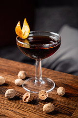 cocktail with nutmeg on the wooden table