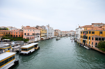 Fototapeta na wymiar 09.10.2019 Venice, Italy, the Grand Canal with a vaporetto, taxi or gondola.