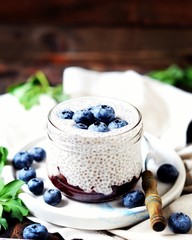 Chia pudding with jam and blueberries, breakfast, still life