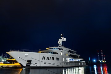 The large white yacht in the port