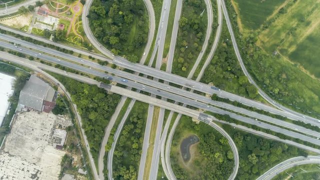 Time lapse aerial view above of circus road traffic cars in bangkok thailand.