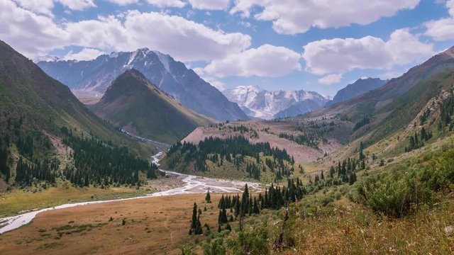 Time Lapse panorama of beautiful Left Talgar mountain valley with river, rocks and forest in Tian Shan mountains near Almaty city; best place for active lifestyle, hiking and trekking in Kazakhstan