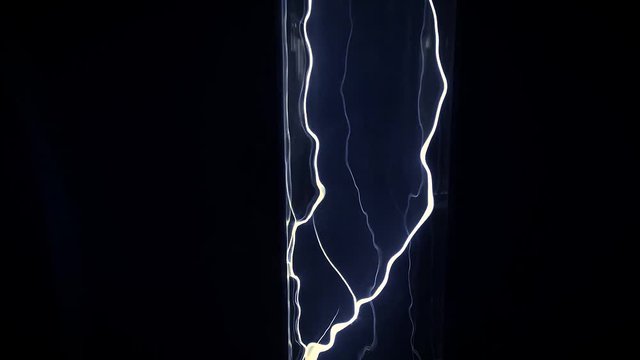 Dynamic plasma flares on a dark background.
