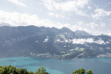 Fototapeta na wymiar The Alps on the shores of turquoise lake, Switzerland