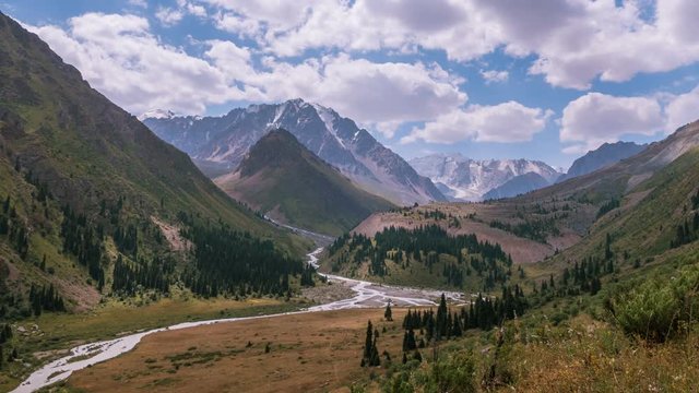 Time Lapse zoom out of beautiful Left Talgar mountain valley with river, rocks and forest in Tian Shan mountains near Almaty city; best place for active lifestyle, hiking and trekking in Kazakhstan