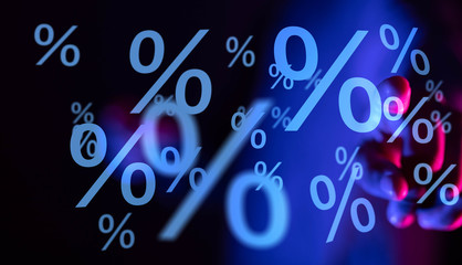 hand touches virtual percent icon