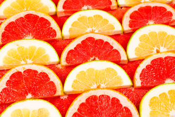 Pomelo and grapefruit slices background.