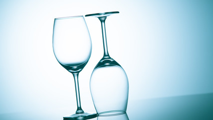 Glasses with water on blue background