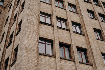 Brick wall and windows of building